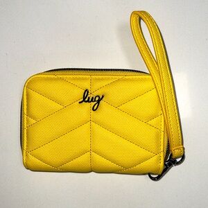NWOT Lug yellow rodeo matte luxe Vl wallet.  Zipper closure